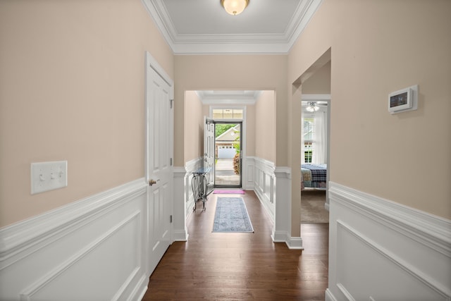 207 Brutus Ln, Summerville, SC 29485 - entrance foyer with ornamental molding, dark wood finished floors, wainscoting, ceiling fan, and a decorative wall