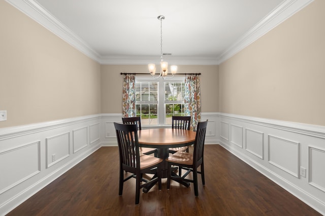 207 Brutus Ln, Summerville, SC 29485 - dining space with a chandelier, crown molding, dark wood-style floors, wainscoting, and a decorative wall