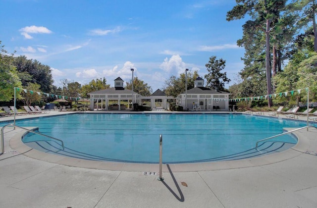 community pool with a patio