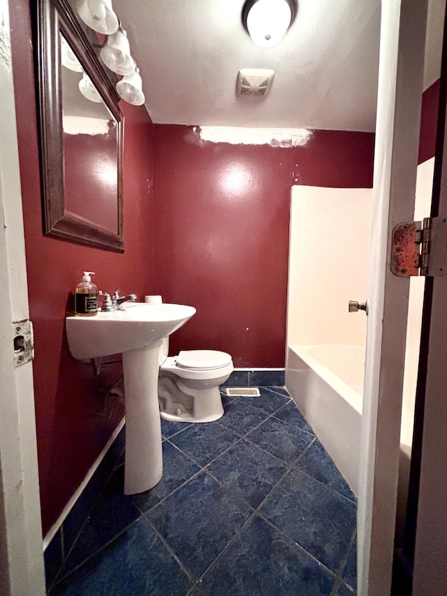 1871 Grimball Rd, Charleston, SC 29412 - bathroom with toilet, a tub to relax in, baseboards, tile patterned flooring, and a shower