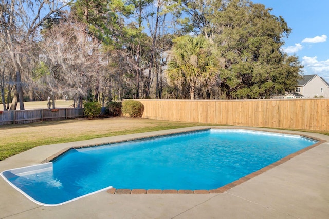 view of swimming pool with a yard, a fenced backyard, and a fenced in pool