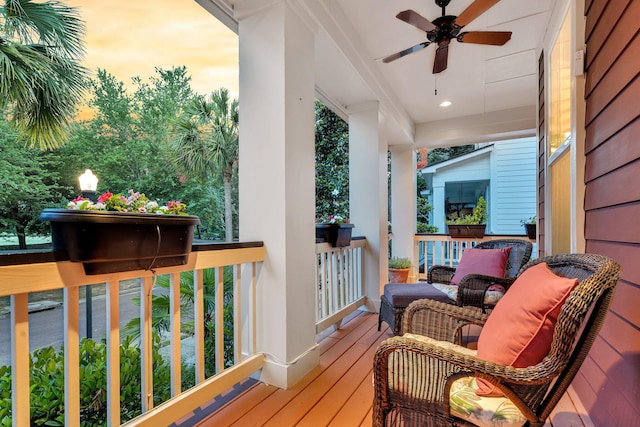 134 Etiwan Park St, Charleston, SC 29492 - balcony at dusk featuring a ceiling fan and a porch