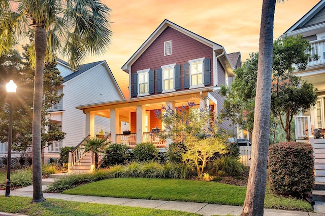 134 Etiwan Park St, Charleston, SC 29492 - view of front of house featuring covered porch, a front lawn, and stairway