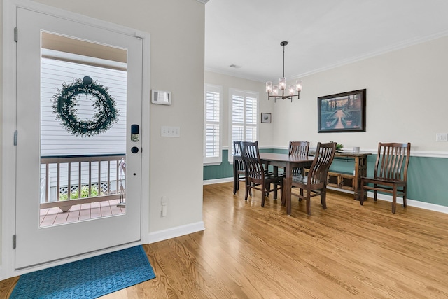134 Etiwan Park St, Charleston, SC 29492 - dining space with a chandelier, plenty of natural light, light wood-style floors, baseboards, and crown molding