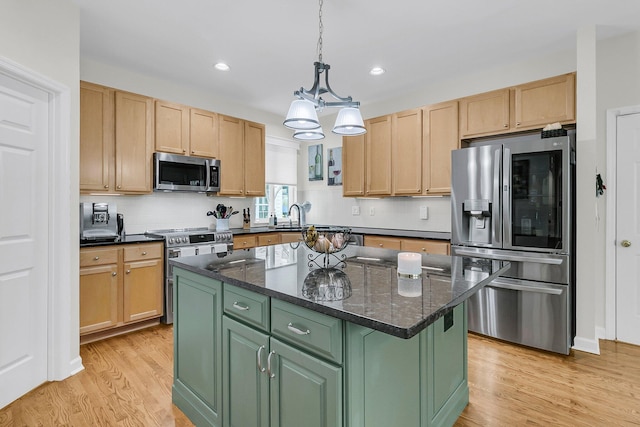 134 Etiwan Park St, Charleston, SC 29492 - kitchen with stainless steel appliances, light wood-style floors, decorative backsplash, a center island, and recessed lighting