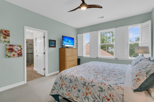 134 Etiwan Park St, Charleston, SC 29492 - carpeted bedroom featuring baseboards, a ceiling fan, and ensuite bath