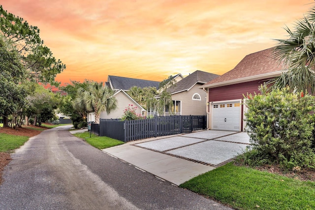 134 Etiwan Park St, Charleston, SC 29492 - view of front of house with concrete driveway, a garage, and a shingled roof