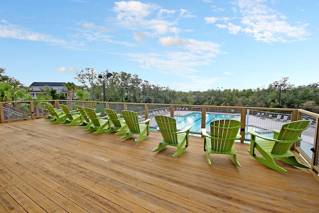 134 Etiwan Park St, Charleston, SC 29492 - wooden deck with view of wooded area and a community pool