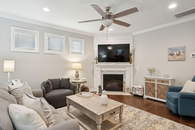 259 Camber Rd, Huger, SC 29450 - living room featuring wood finished floors, crown molding, ceiling fan, a fireplace, and recessed lighting