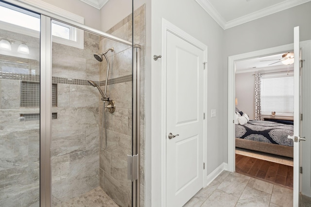 259 Camber Rd, Huger, SC 29450 - bathroom featuring ornamental molding, connected bathroom, a shower stall, ceiling fan, and baseboards