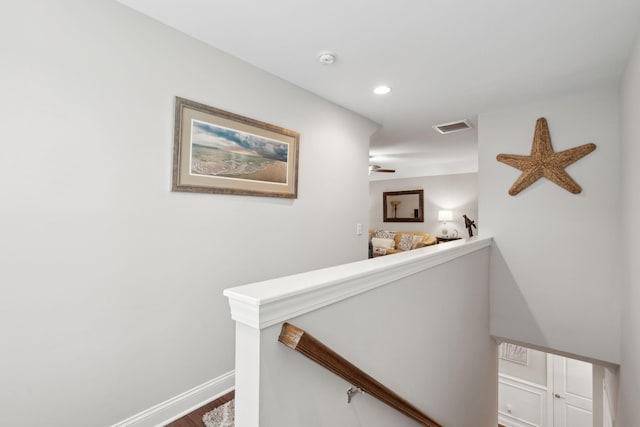 259 Camber Rd, Huger, SC 29450 - hall featuring an upstairs landing, wood finished floors, baseboards, and recessed lighting