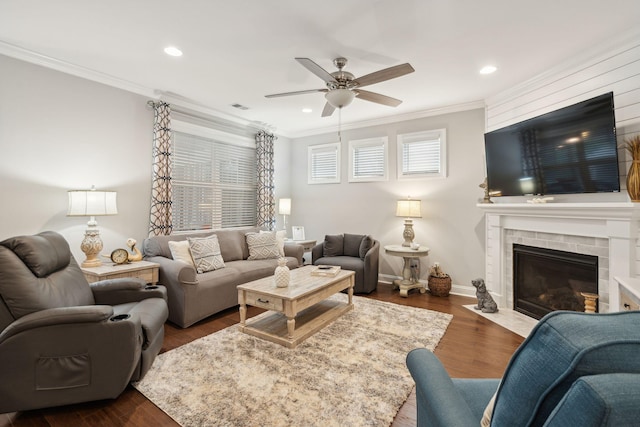 259 Camber Rd, Huger, SC 29450 - living area featuring ornamental molding, a ceiling fan, dark wood-style floors, a fireplace, and recessed lighting