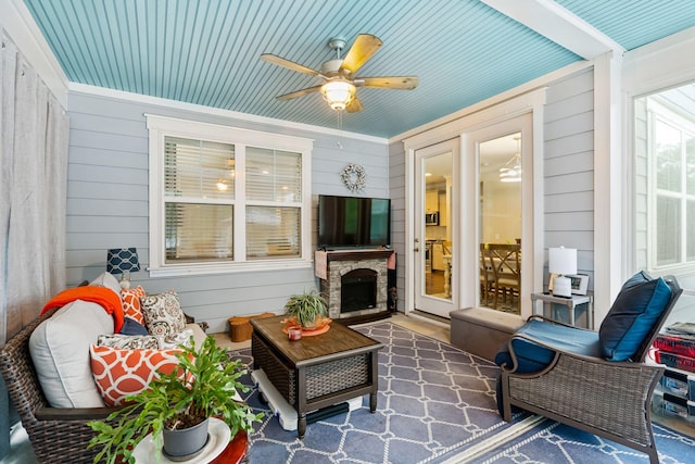 259 Camber Rd, Huger, SC 29450 - sunroom featuring a ceiling fan and a fireplace