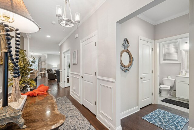 259 Camber Rd, Huger, SC 29450 - entryway with crown molding, a chandelier, dark wood finished floors, baseboards, and recessed lighting