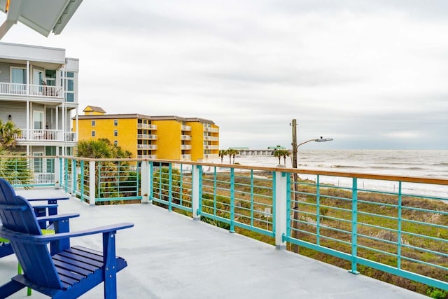 view of patio with a balcony