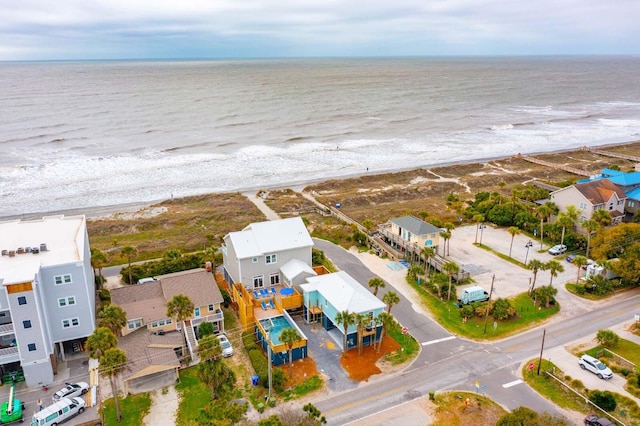 aerial view featuring a water view and a view of the beach