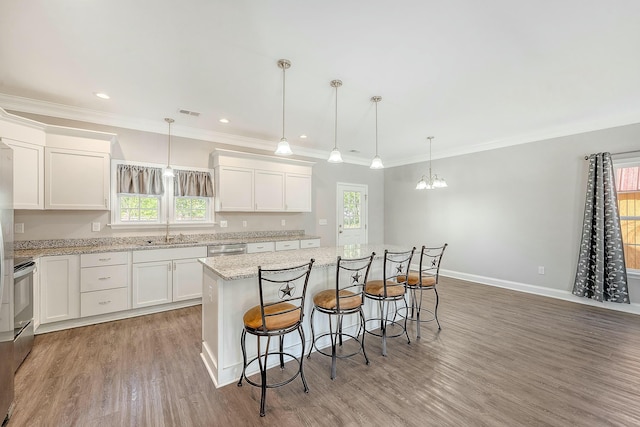 kitchen featuring white cabinets and light wood-type flooring