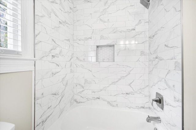 bathroom with shower / washtub combination