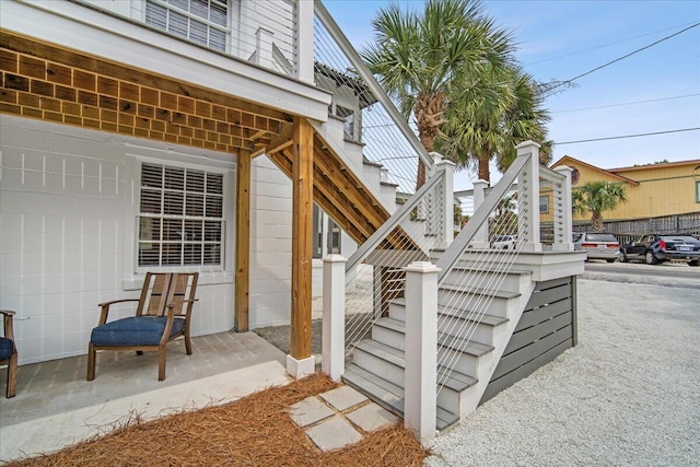 view of patio with stairway