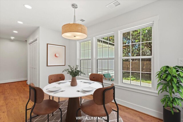 1430 E Montague Ave, North Charleston, SC 29405 - dining area with baseboards, plenty of natural light, wood finished floors, and recessed lighting