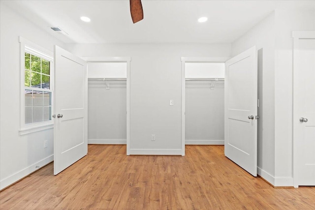 1430 E Montague Ave, North Charleston, SC 29405 - unfurnished bedroom featuring light wood-type flooring, baseboards, multiple closets, recessed lighting, and a ceiling fan