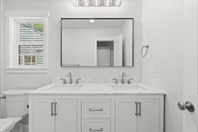 1430 E Montague Ave, North Charleston, SC 29405 - full bathroom featuring toilet and double vanity