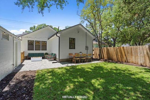 1430 E Montague Ave, North Charleston, SC 29405 - back of property with a patio and an outdoor living space
