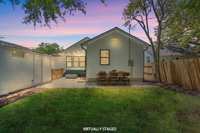 1430 E Montague Ave, North Charleston, SC 29405 - back of house at dusk with a patio area
