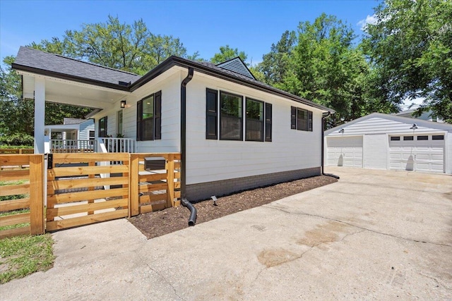1430 E Montague Ave, North Charleston, SC 29405 - single story home featuring an outdoor structure, a garage, and a porch