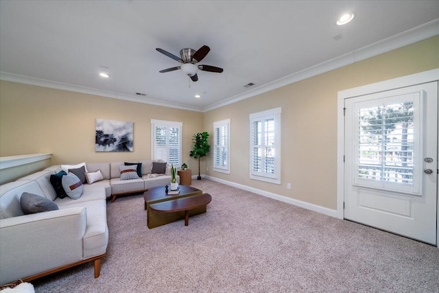 living area with crown molding, recessed lighting, light carpet, ceiling fan, and baseboards