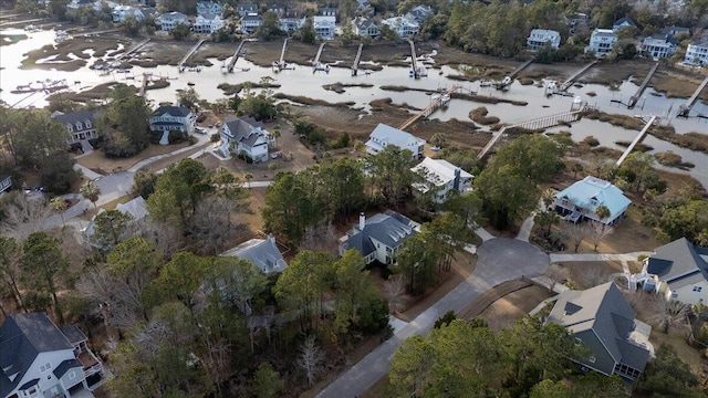 birds eye view of property with a residential view