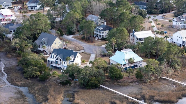 birds eye view of property with a residential view