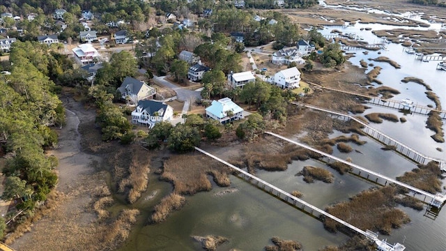 aerial view with a water view and a residential view