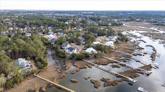 aerial view featuring a residential view and a water view