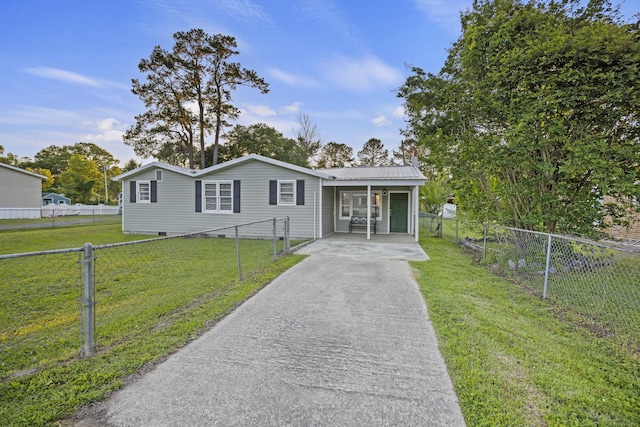 view of front of home with asphalt driveway