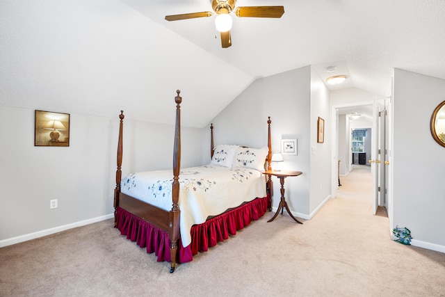 bedroom with light carpet, ceiling fan, and lofted ceiling