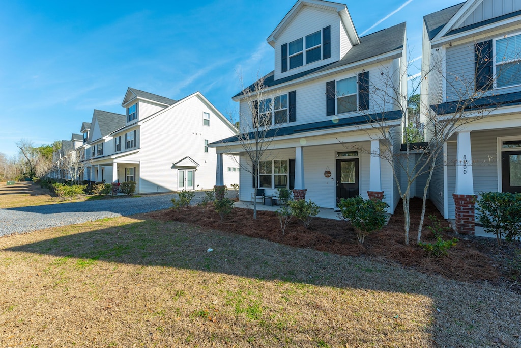 8202 S Antler Dr, North Charleston, SC 29406 - view of front of home featuring a front lawn and a porch