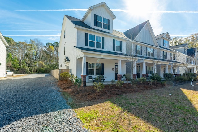 view of front of property featuring covered porch