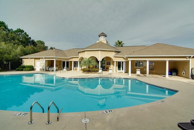 pool with a patio
