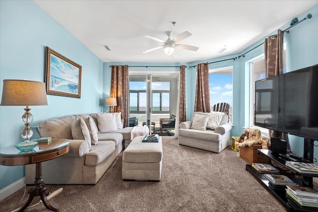 216 W Arctic Ave Unit 9, Folly Beach, SC 29439 - living room featuring a ceiling fan and carpet floors