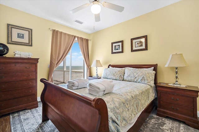 216 W Arctic Ave Unit 9, Folly Beach, SC 29439 - bedroom with access to outside, a water view, and a ceiling fan