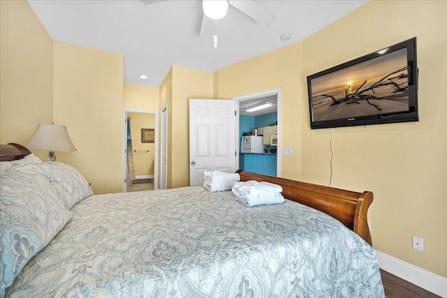 216 W Arctic Ave Unit 9, Folly Beach, SC 29439 - bedroom with baseboards, wood finished floors, ceiling fan, and freestanding refrigerator