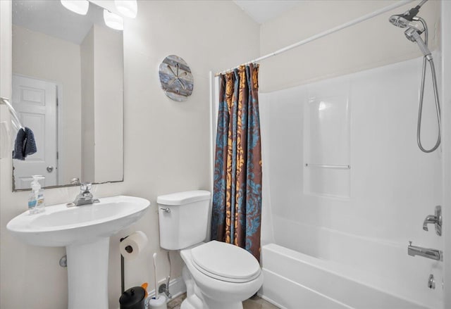 216 W Arctic Ave Unit 9, Folly Beach, SC 29439 - full bathroom featuring shower / bathtub combination with curtain and toilet