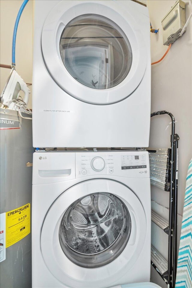 216 W Arctic Ave Unit 9, Folly Beach, SC 29439 - laundry area with stacked washing machine and dryer