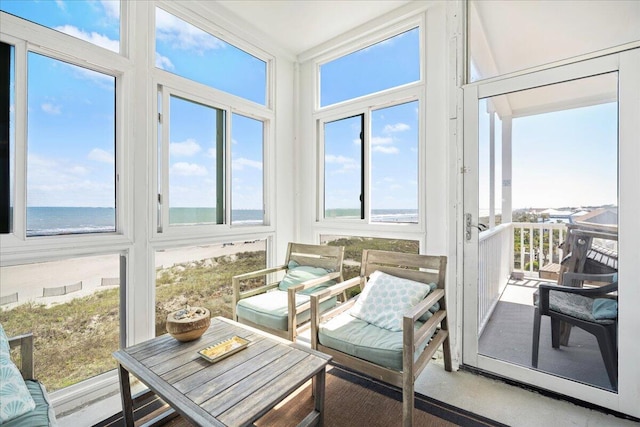 216 W Arctic Ave Unit 9, Folly Beach, SC 29439 - sunroom / solarium with a water view and healthy amount of natural light