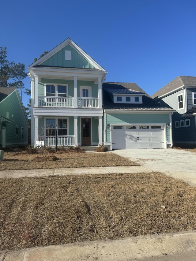 view of front of home featuring a garage and covered porch