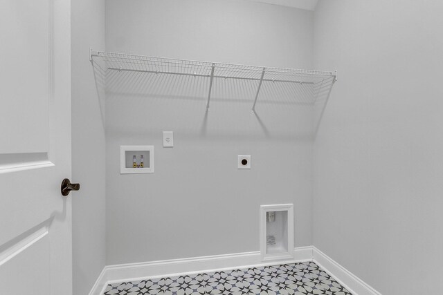 washroom featuring hookup for a washing machine, laundry area, hookup for an electric dryer, and baseboards