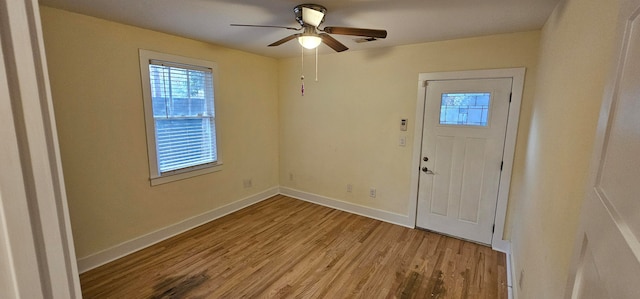 entryway featuring light hardwood / wood-style flooring and ceiling fan