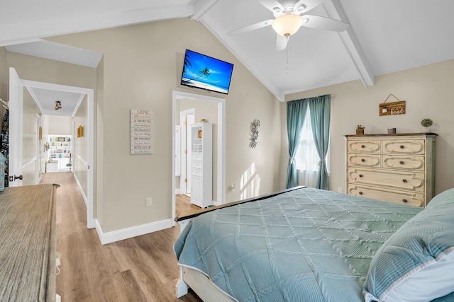 bedroom with ceiling fan, light hardwood / wood-style floors, and vaulted ceiling with beams