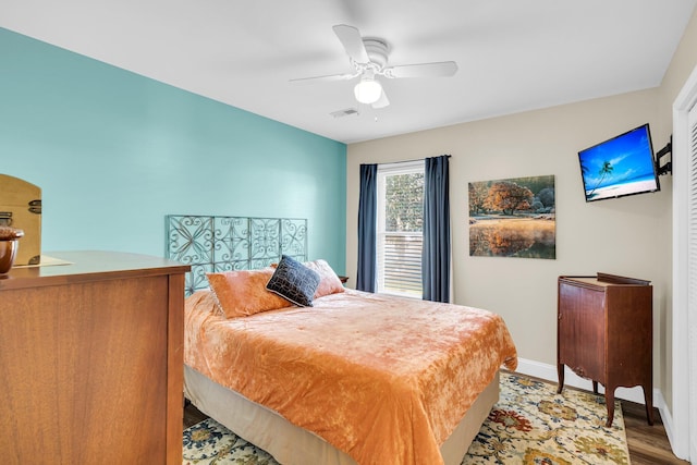 bedroom featuring ceiling fan and light hardwood / wood-style flooring